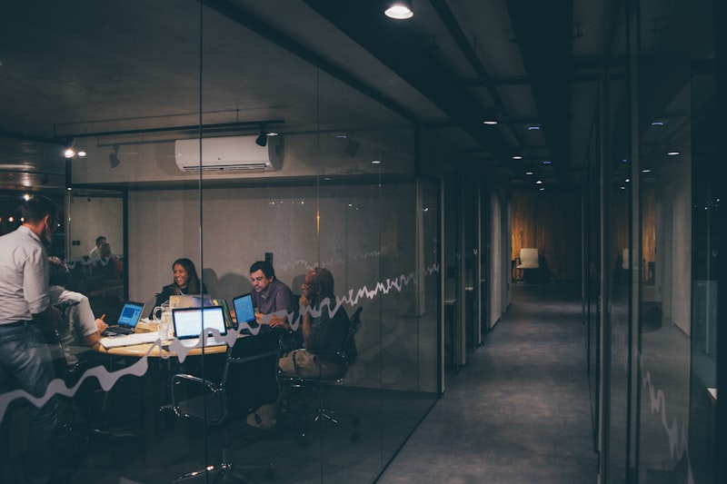 A small group of people in a meeting together