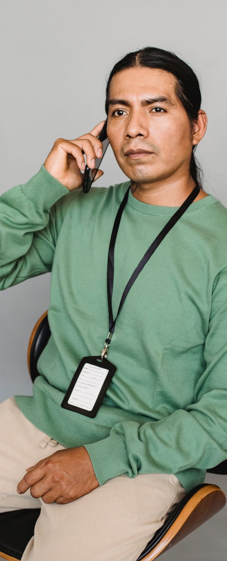 A serious person talking on the phone