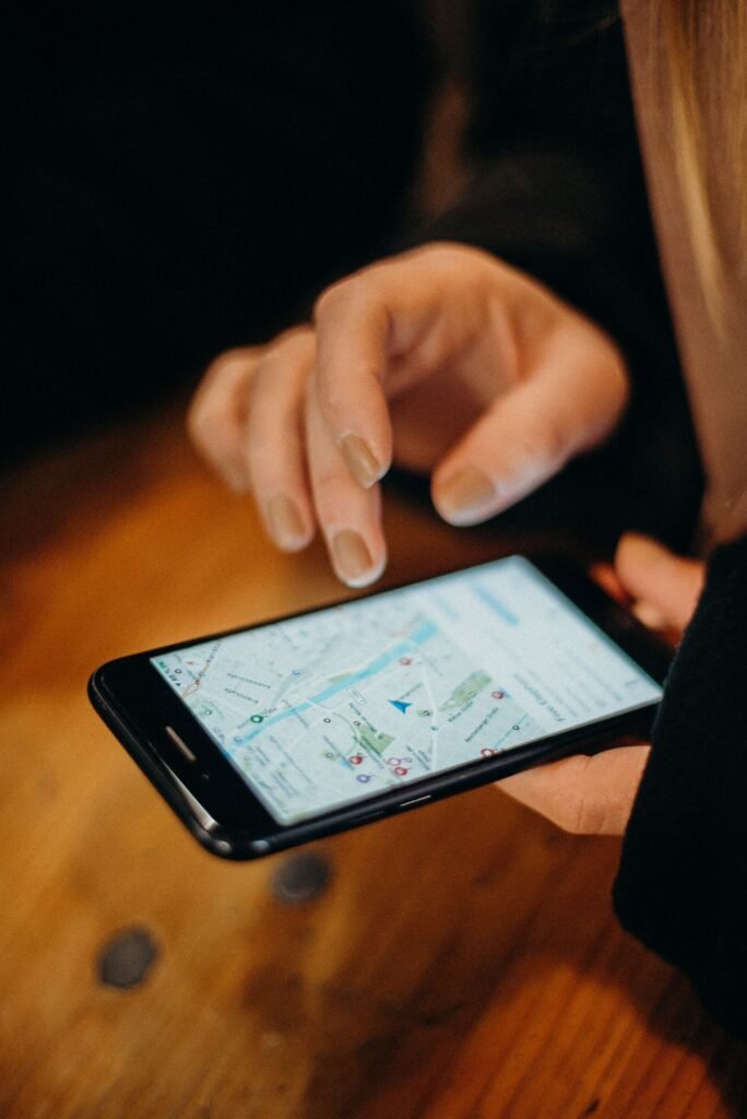 A person checking a location map on a smartphone